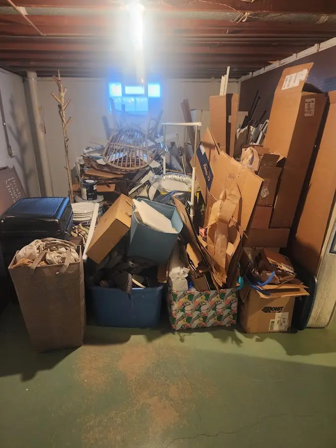 Roll-off dumpster container at job site for 20 Yard Dumpster Rental in Aspen Hill